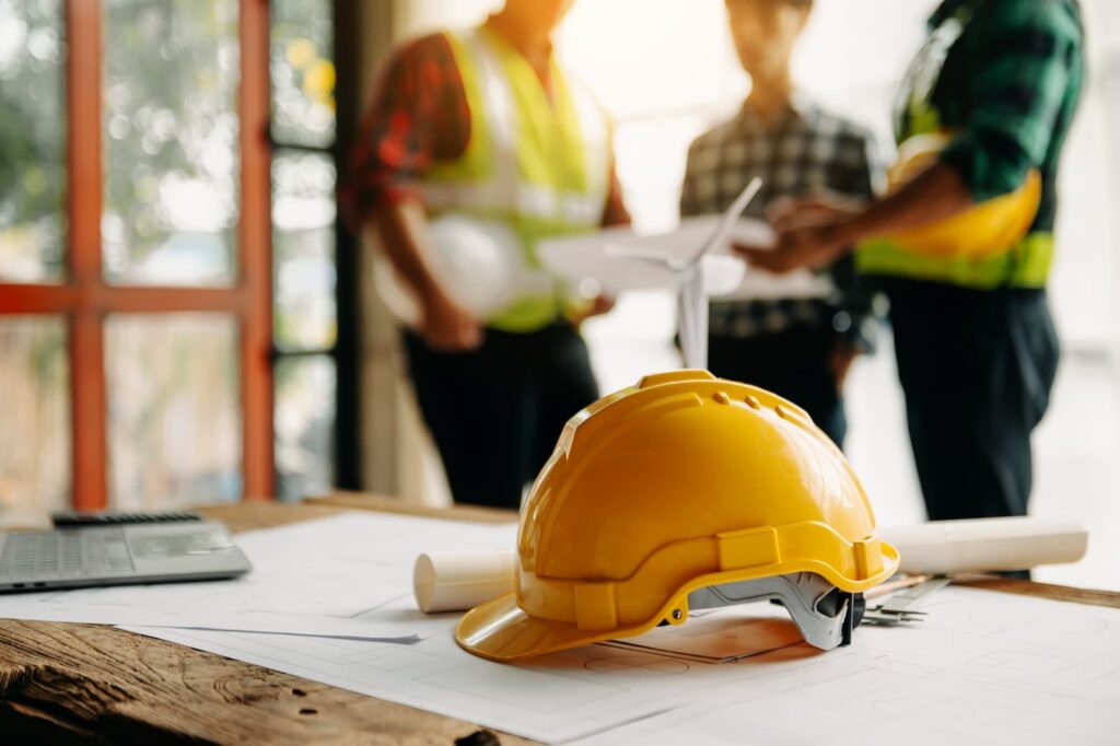 An image of construction workers for a blog discussing how the UK government is cracking down on illegal workers.
