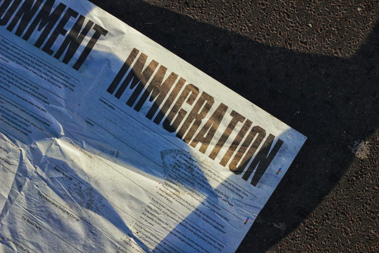 An immigration banner accompanies a blog discussing tougher treatments for illegal workers.