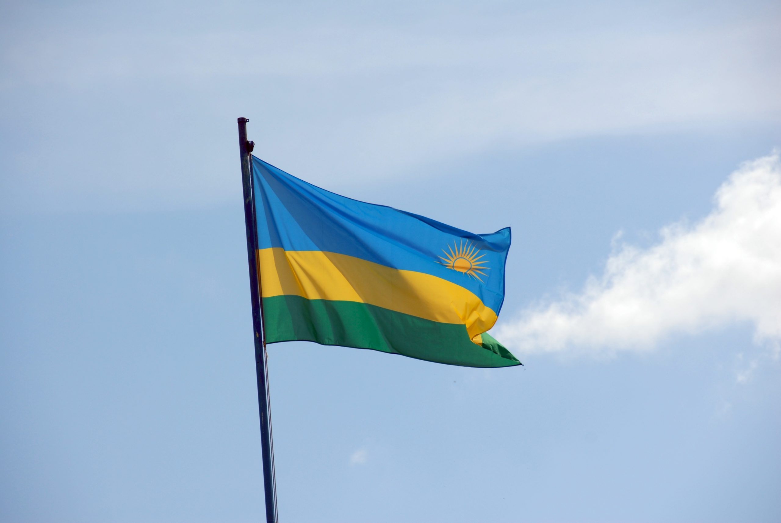 Rwanda_Flag_Against_Light_Blue_Sky