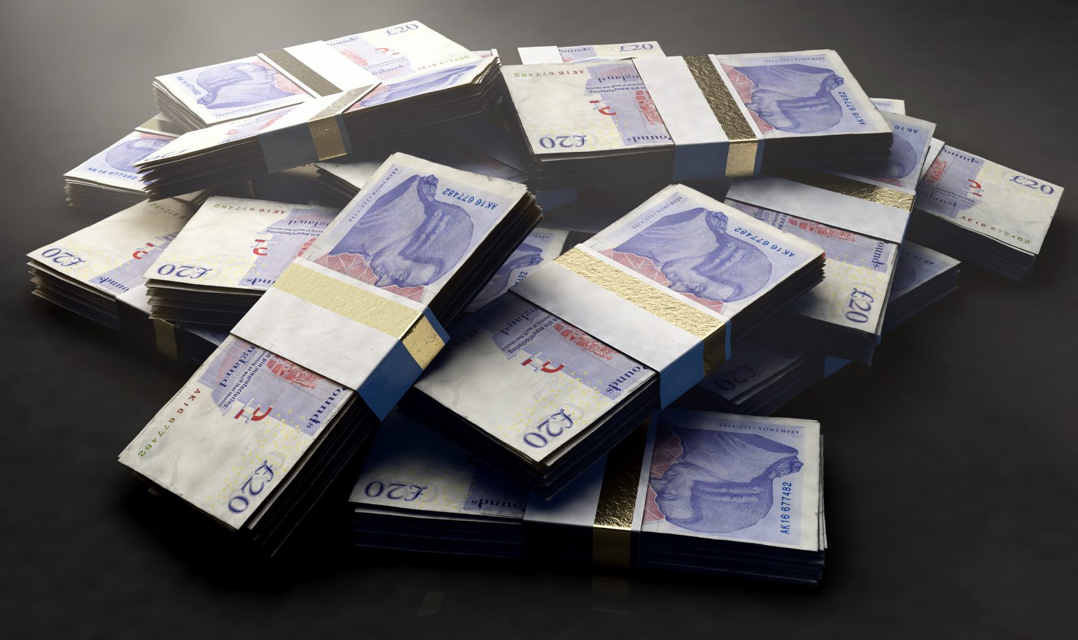 A pile of randomly scattered bundles of british pound banknotes on an isolated background - 3D render