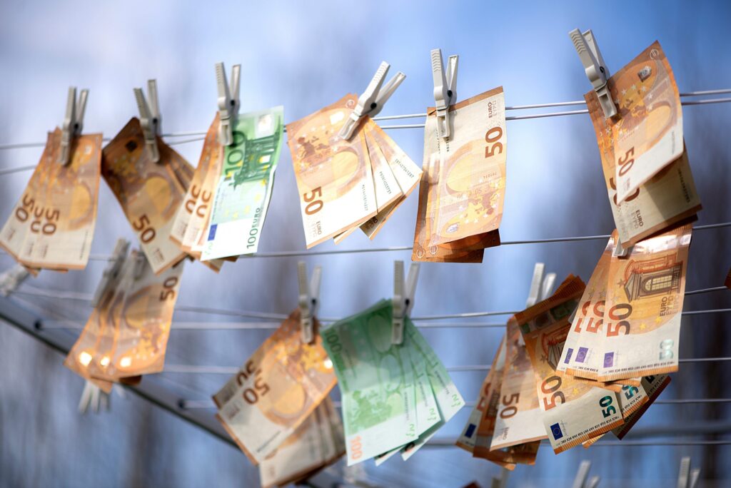 100 and 50 euro banknotes drying. Washed Euro paper bills. Drying euro on a string.Money laundering