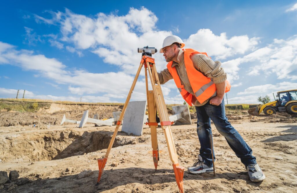 Surveyor on a building site