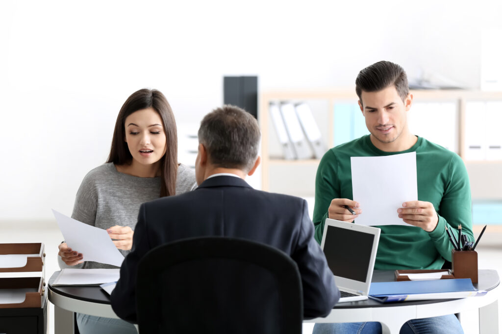 Young couple at notary public office