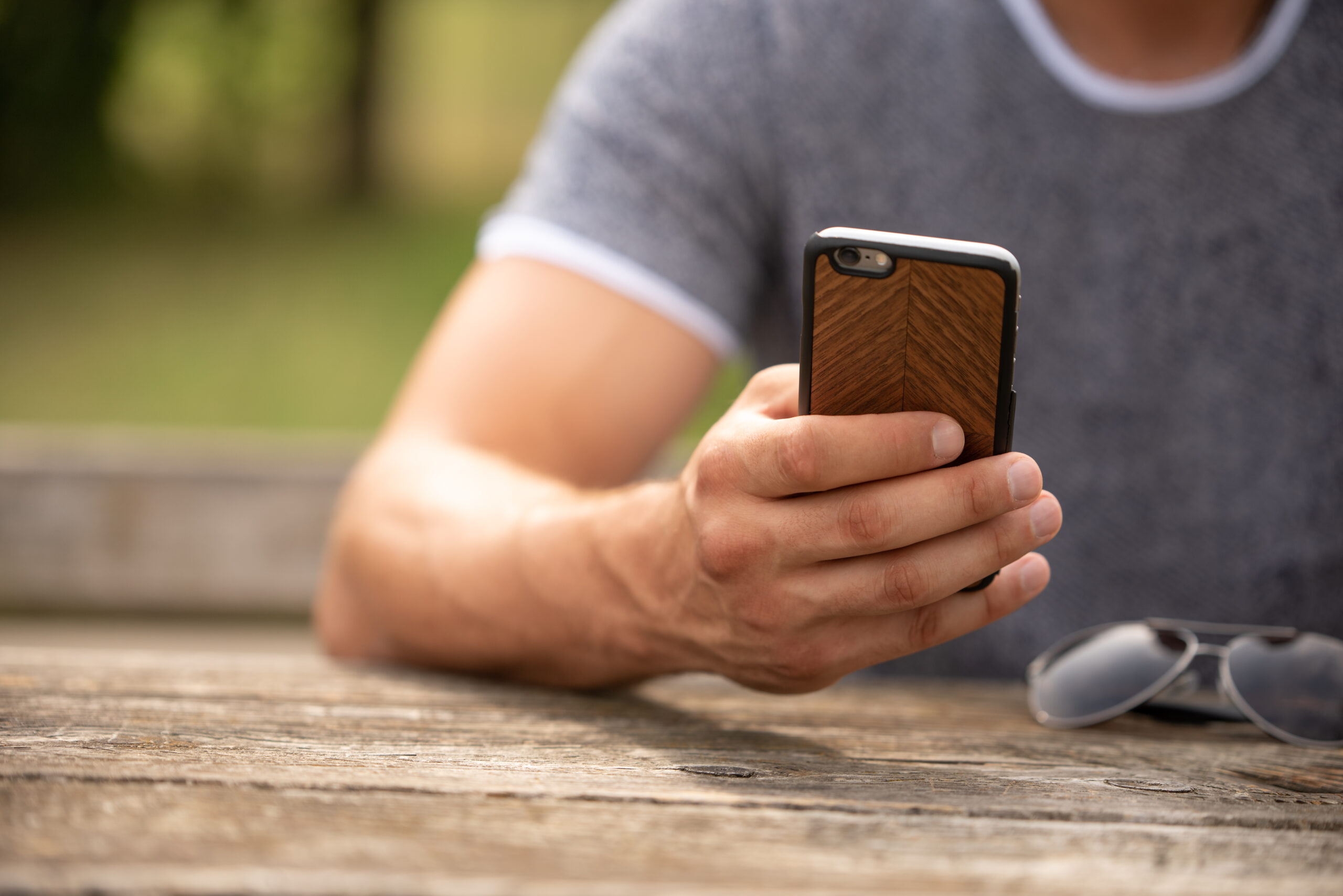 man holding phone in hand