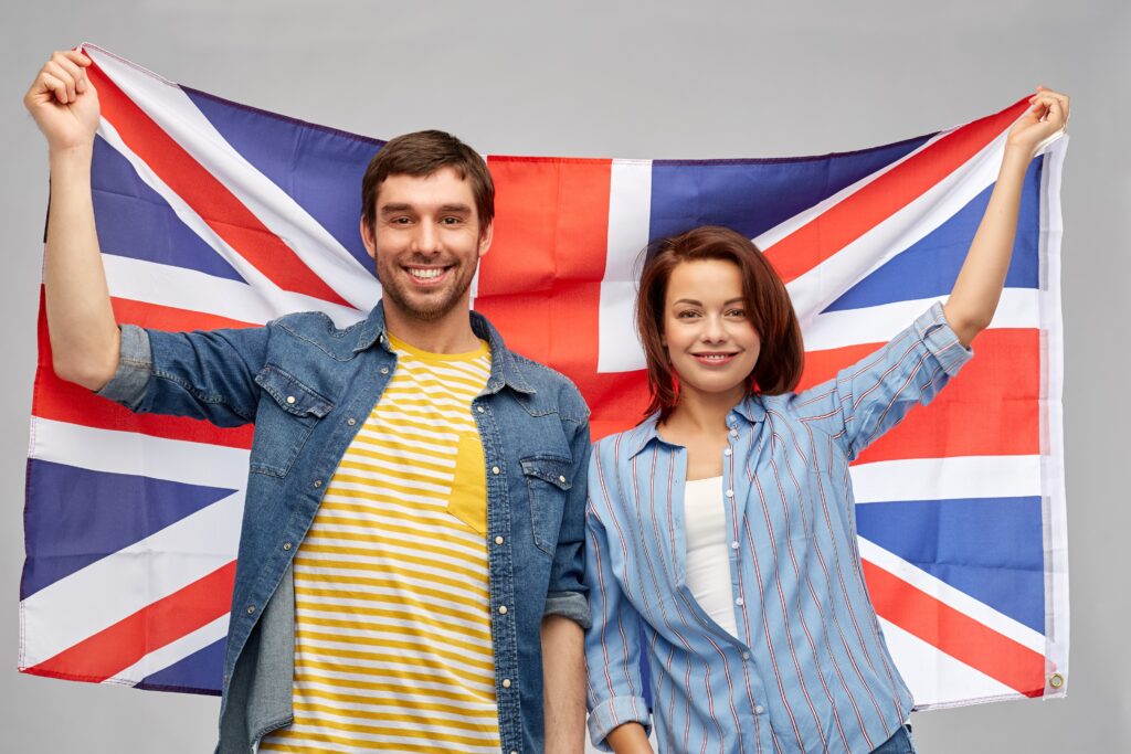 Man and Woman holding Union Flag