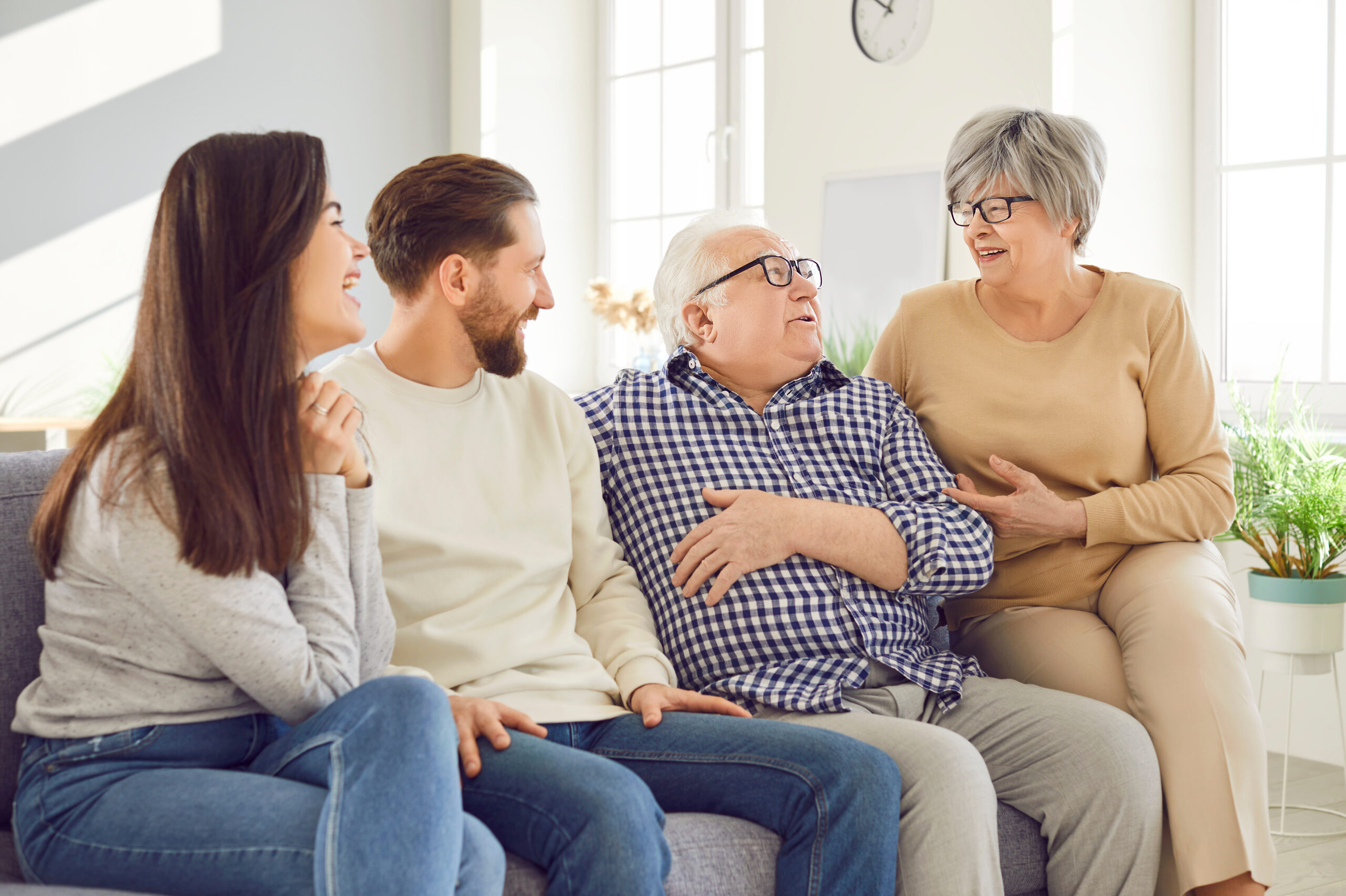 Happy family aging old parents and adult children two generations spending good time together