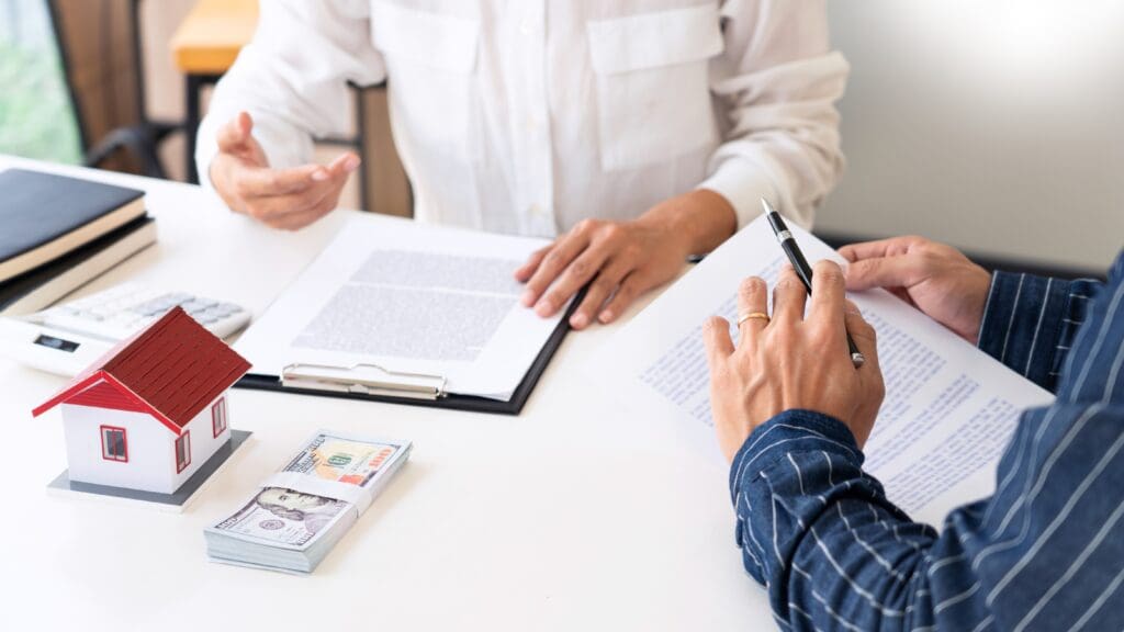 Sale agent representative offer house purchase contract to buy a property or apartment to customer