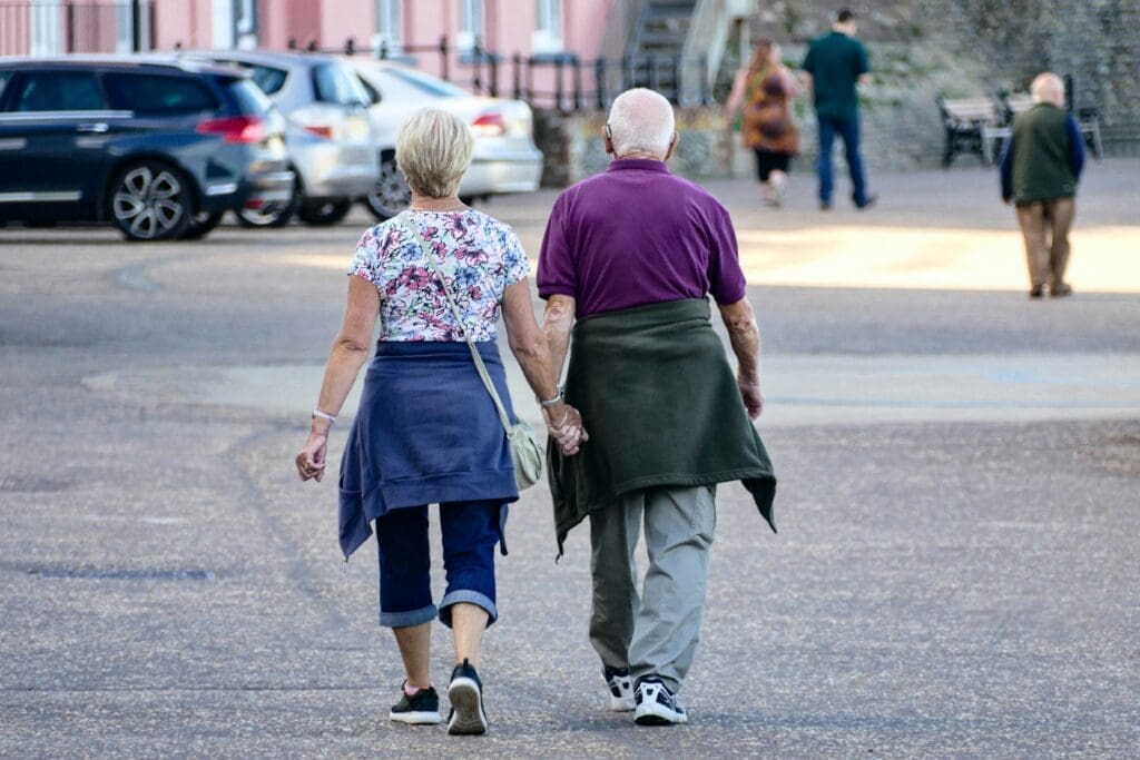 old couple holding hands