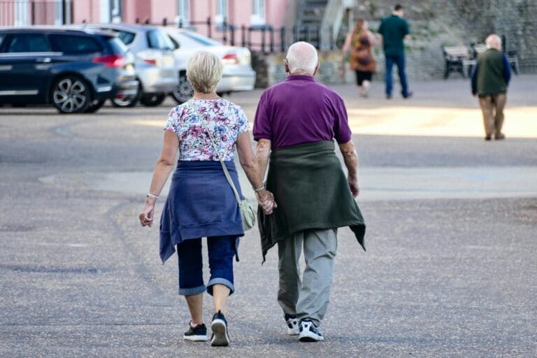 old couple holding hands
