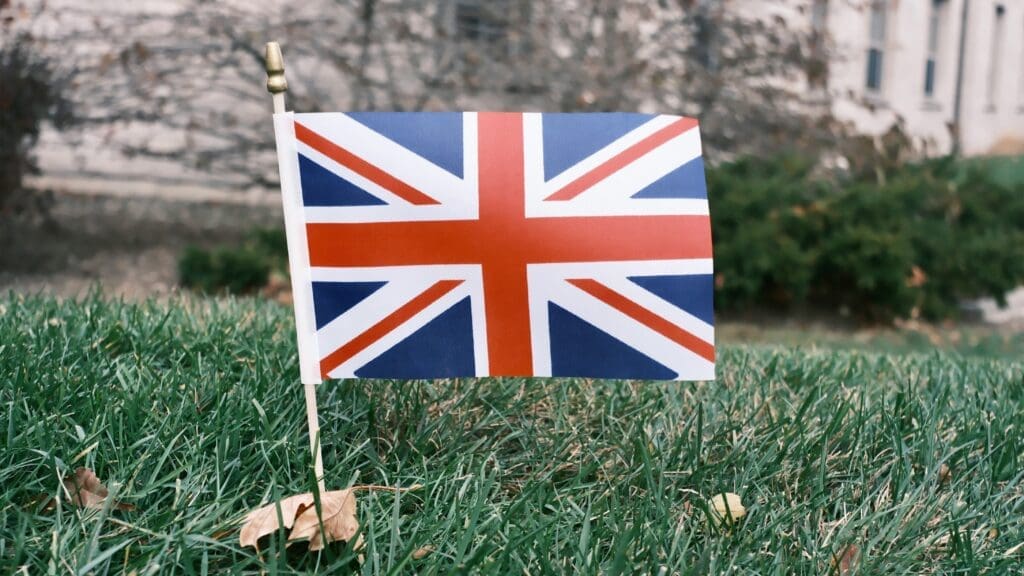 British flag planted in grass