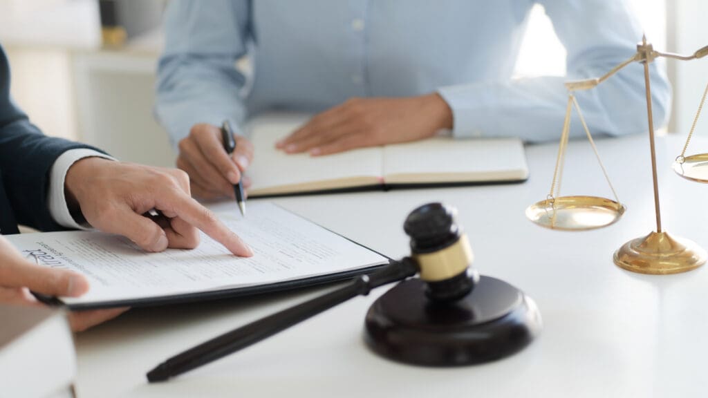 Lawyer consultant explaining to client with law suit.