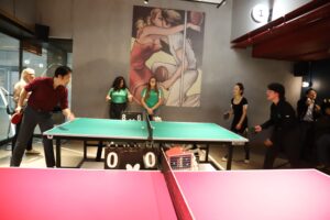 People playing table tennis